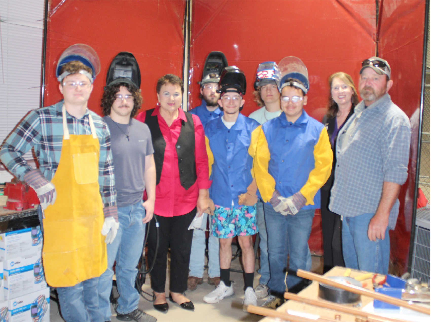 A group of students join Superintendent Kathy Burns and educators as they celebrate the receipt of grant funds for a new welding technology program for Nassau County. Submitted