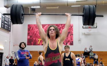 West Nassau’s Tucker Shuler takes his turn, placing second in Traditional in the 238 class at the county meet. 