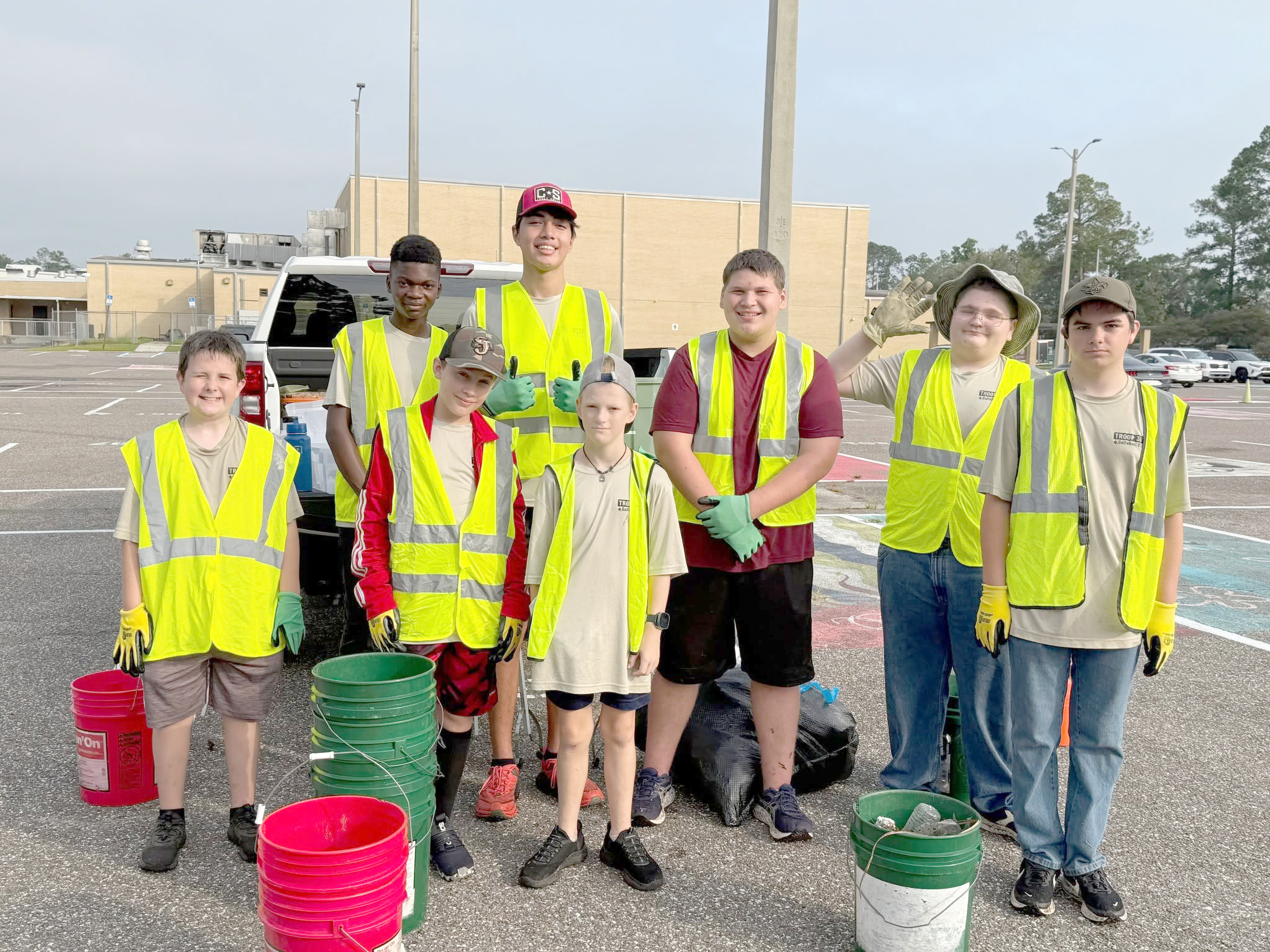 Callahan Boy Scout Troop 351 braves the heat  Saturday to keep Callahan’s Warrior Drive and Brown Street litter free. The troop is an Adopt-a-Highway partner for Keep Nassau Beautiful, Inc. Submitted