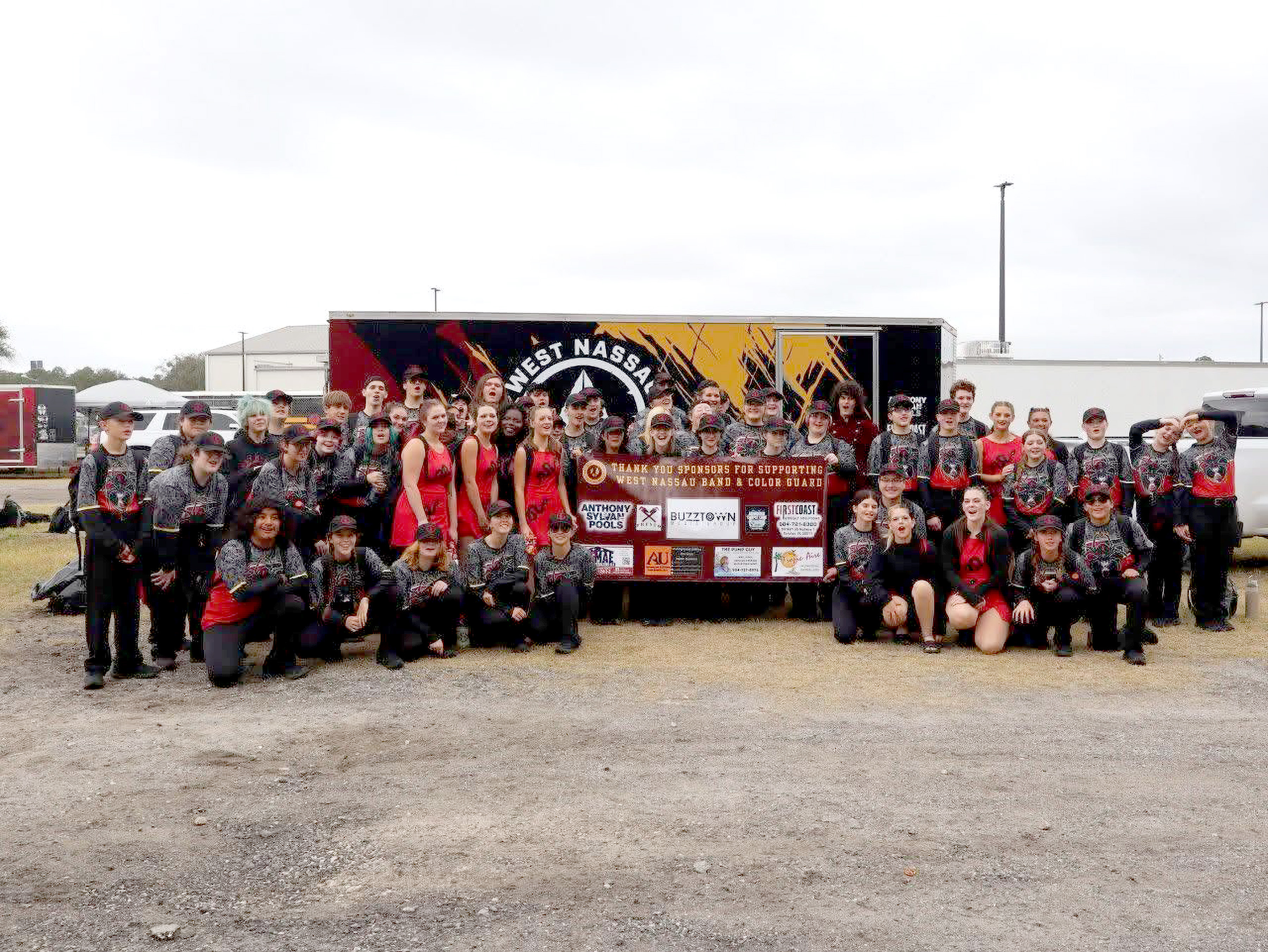 Battling rain and high winds, the West Nassau Warrior Band and West Nassau Warrior Color Guard rank overall superior with the Florida Bandmasters Association.