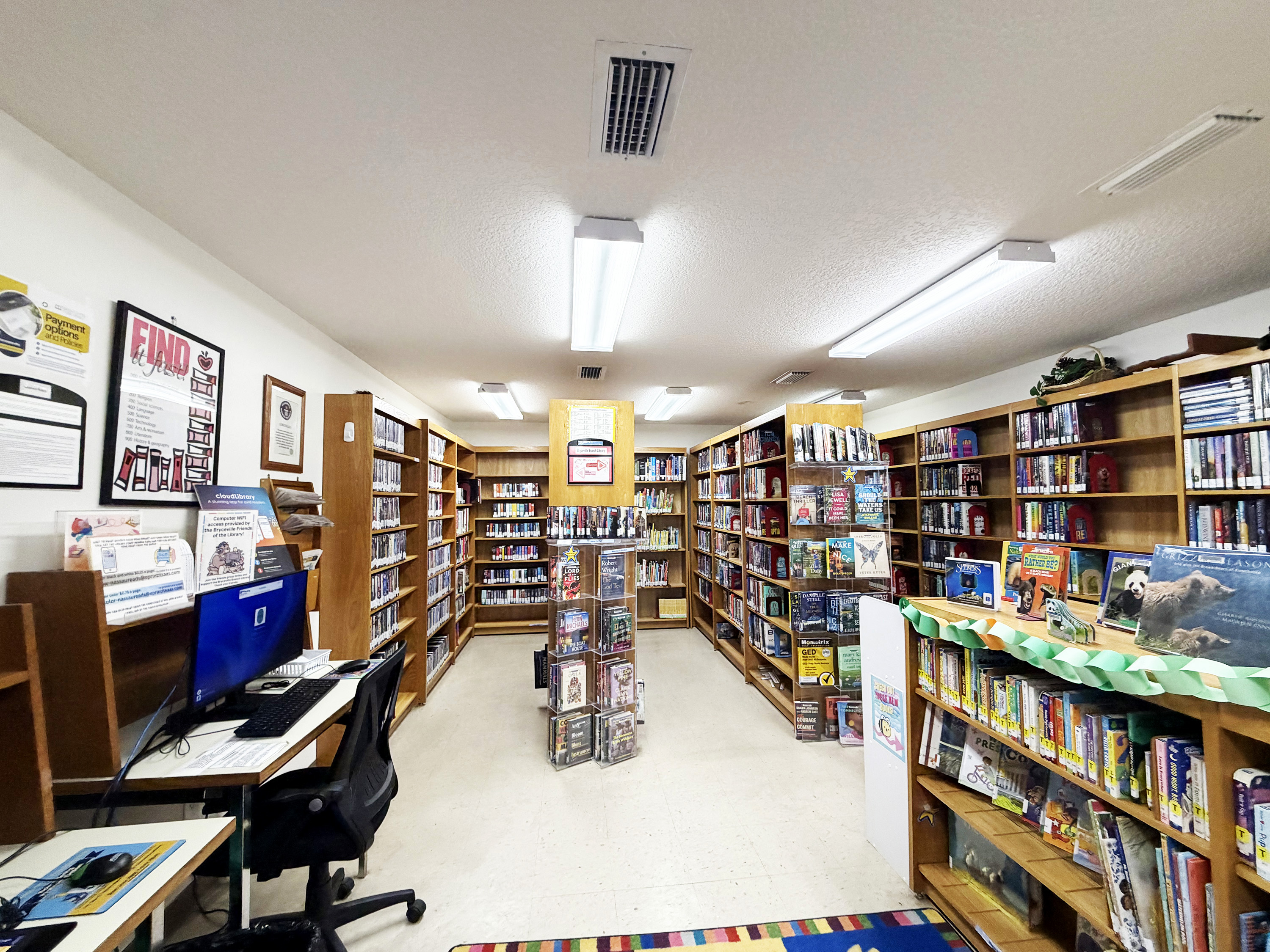 The Bryceville Branch Library’s shelves will soon be empty as staff works to close the branch next week. The Nassau County Commission voted to close the branch in an attempt to reduce expenditures. Photo by Britney Fletcher West