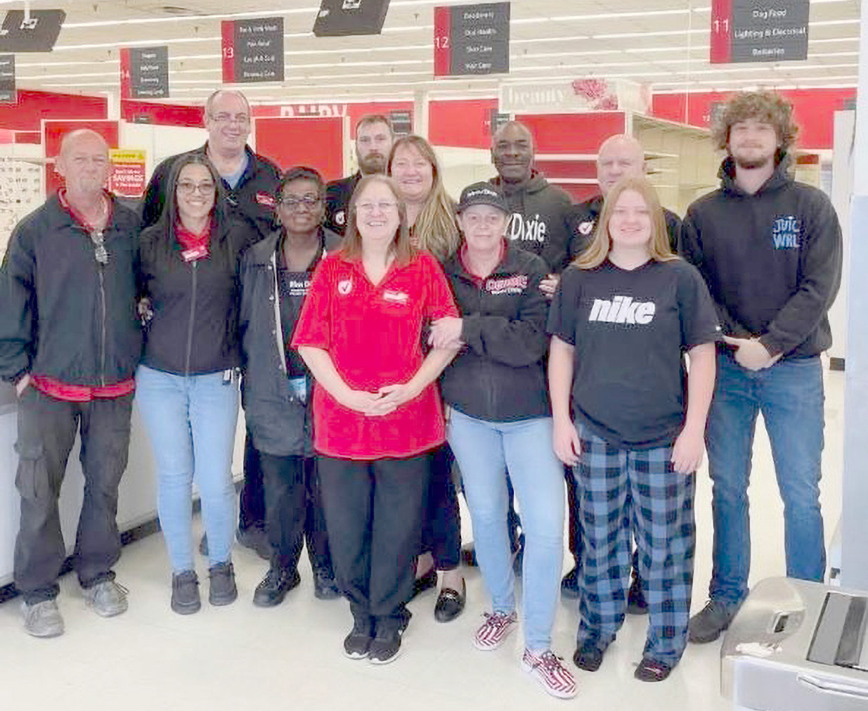 Callahan Winn-Dixie employees join together for a photo as the store closes its doors Sunday morning. The conversion to an Aldi should be complete by summer 2027. Submitted