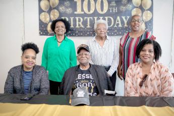 Sylvester Ross is blessed by God, as his shirt reads. The Hilliard veteran celebrated his 100th birthday with family and friends March 11. Photo courtesy of the Nassau County Council on Aging