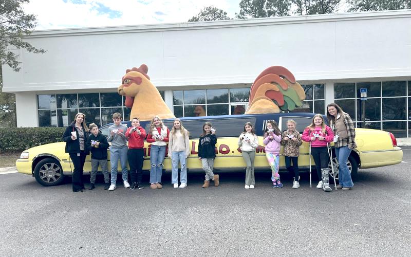 In celebration of fundraiser success, Callahan Intermediate School students ride in a chicken limo to enjoy lunch at Chick-fil-A.