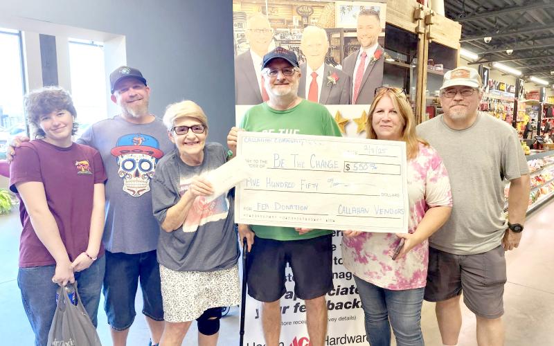 Joel Pace accepts a $550 donation for Be the Change Northeast Florida Feb. 8.