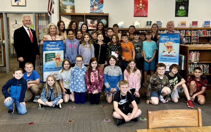 St. George Elementary School students and administrators join Georgia School Superintendent Richard Woods Feb. 13 to celebrate SGES as a Literacy Leader School and a Math Leader School for third through fifth grades. Submitted