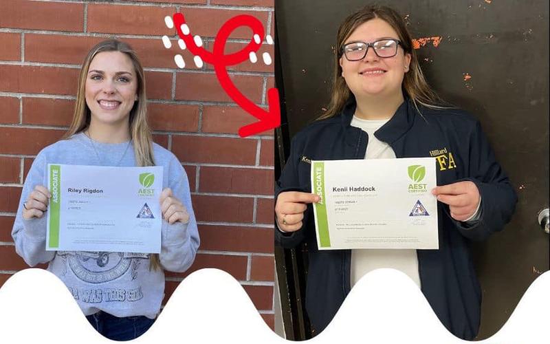 Hilliard Middle-Senior High School students Riley Rigdon, Kenli Haddock display their certificates.