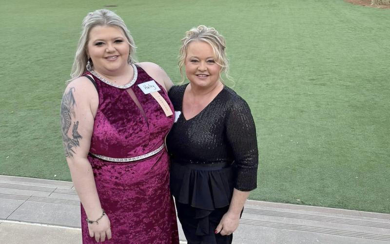Cynthia Hicks, right, and Haley Glisson, left, attend the Nassau County Chamber of Commerce awards Jan. 30 to celebrate their business’ nominations.