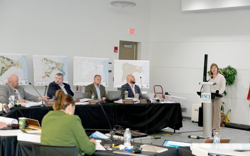 Director of Strategic Advancement and Economic Resources Brandy Carvalho speaks during the Winter Strategic Planning Session. From left are Commissioner Klynt Farmer, Deputy County Manager Robert Companion, Asst. County Manager Marshall Eyerman, and County Manager Taco Pope. Submitted