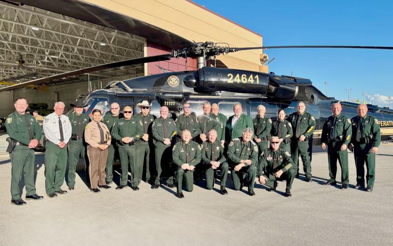 Nassau County Sheriff Bill Leeper, bottom row second from the left, joins other state sheriffs in Miami-Dade County for a news conference about the 287 (g) program. All 67 Florida counties have entered an agreement with ICE to assist in serving warrants to illegal immigrants. Submitted