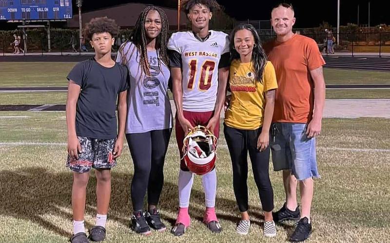 Latasha Taylor stands between sons Bryson and Braydon Taylor, joined by daughter Lexie Jones and husband Tony Taylor. A benefit for the Taylor family will be held Saturday to assist with expenses as Latasha Taylor continues to recover from her injuries. Submitted