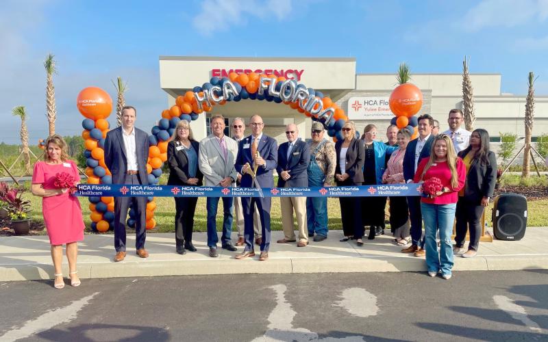Members of the Nassau County Chamber of Commerce and Nassau County commissioners celebrate the opening of HCA Florida Yulee Emergency with HCA CEO Reed Hammond and the medical staff March 31.