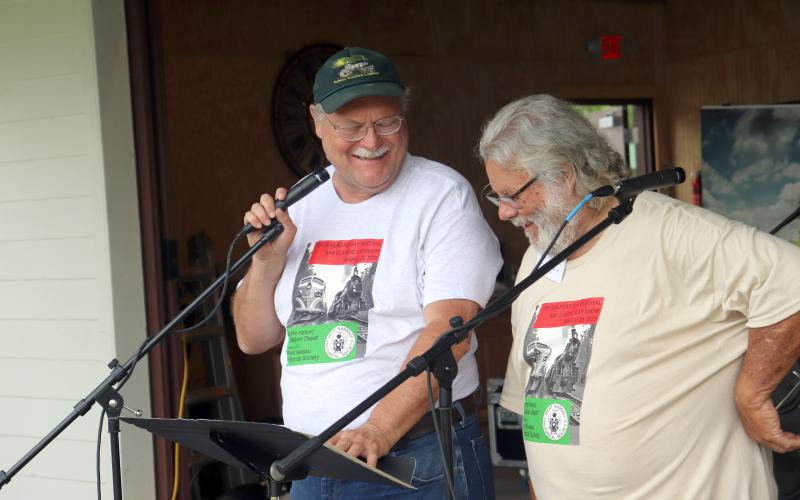 West Nassau Historical Society President John Hendricks shares a laugh with Vice President Jerry Peterson