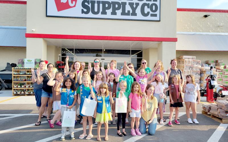 Callahan Girl Scout Troop 63013 donates $900 in food and toys to Nassau County Animal Services.