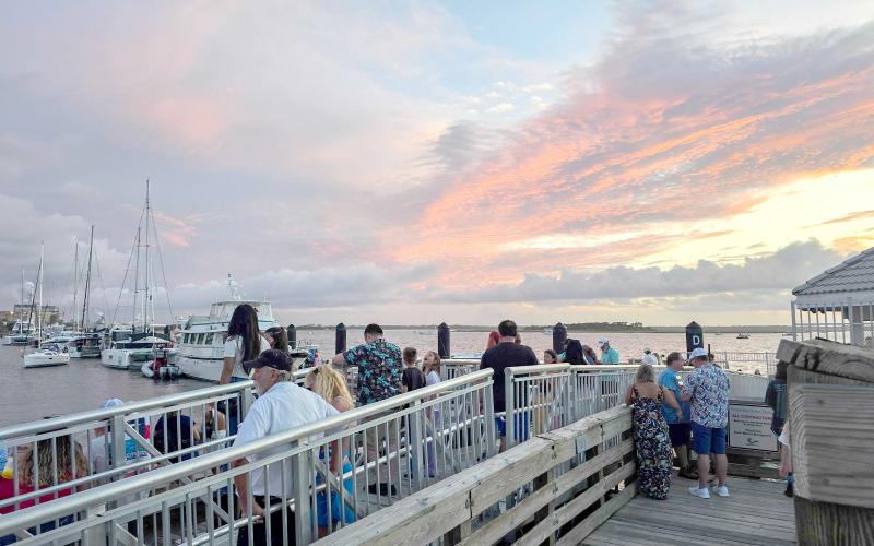 The gangway that collapsed during the Hometown Fourth of July Friday night event is pictured at top, full of spectators less than an hour before the collapse, pictured above. Photos by Ashley Chandler