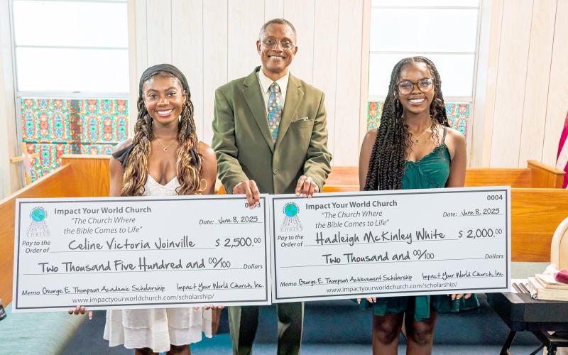 Impact Your World Church Pastor Kalvin Thompson presents Celine Joinville and Hadleigh White with their scholarships.