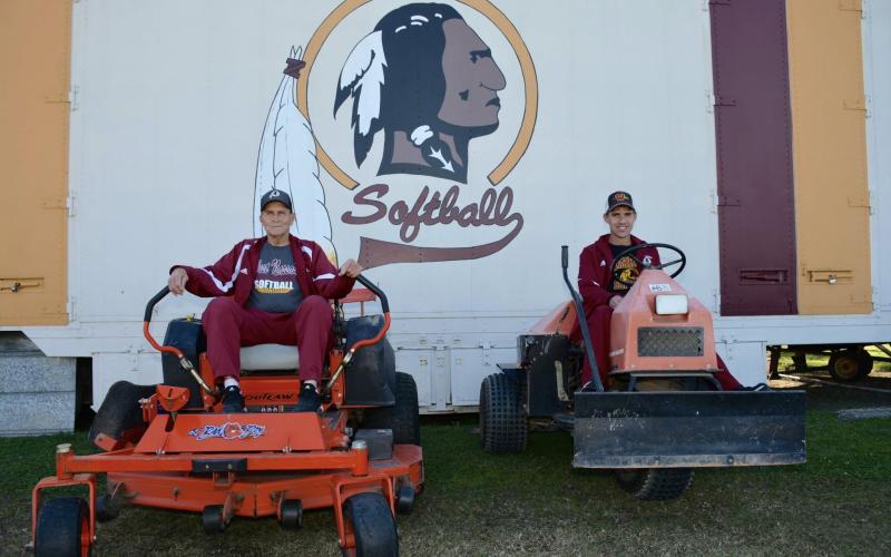 Coach David Crosby, left, befriended Staten Dempsey and the duo spent numerous hours maintaining the softball and football fields at West Nassau High School. Crosby guided softball players for decades, also mentoring fellow coaches. Submitted