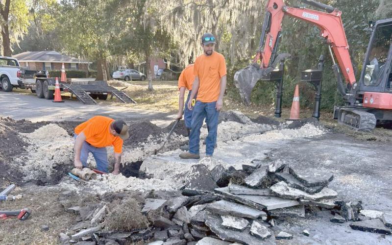 Hilliard Public Works Department employees repair a water service line on Front Street between Illinois and Florida streets Monday morning. Photo courtesy of the Town of Hilliard
