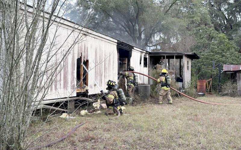 Firefighters extinguish the blaze at 28247 Pike Road, Hilliard Dec. 5. Photo courtesy of Nassau County Fire Rescue Professionals Local 3101