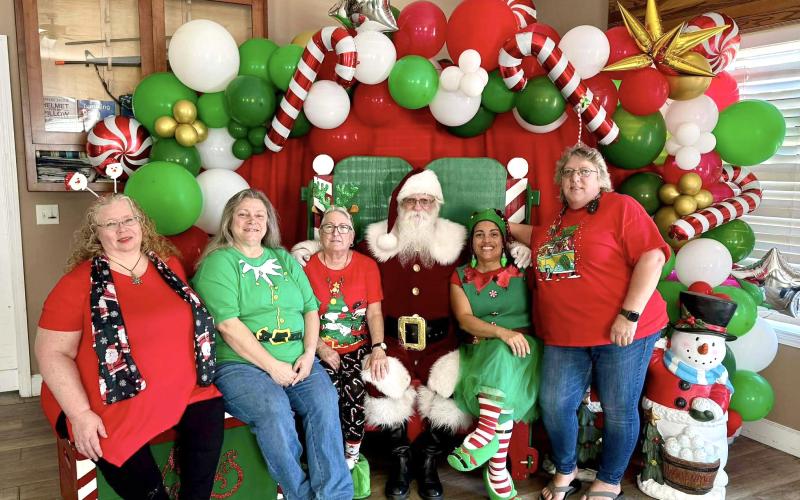Children shared their wish lists with Santa Claus and received stockings filled with treats. Submitted