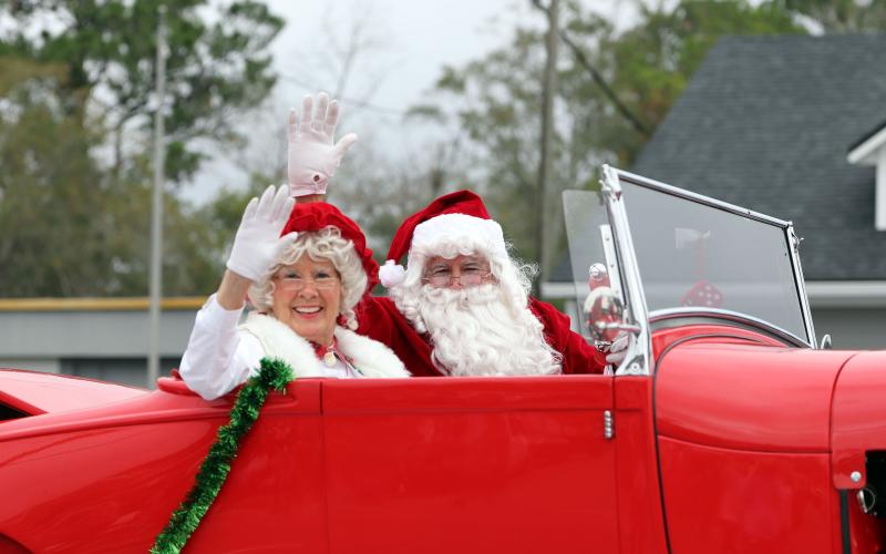 Santa and Mrs. Claus, as well as the staff of this newspaper, wish everyone a very merry Christmas full of peace and joy. Photo by Amanda Bishop