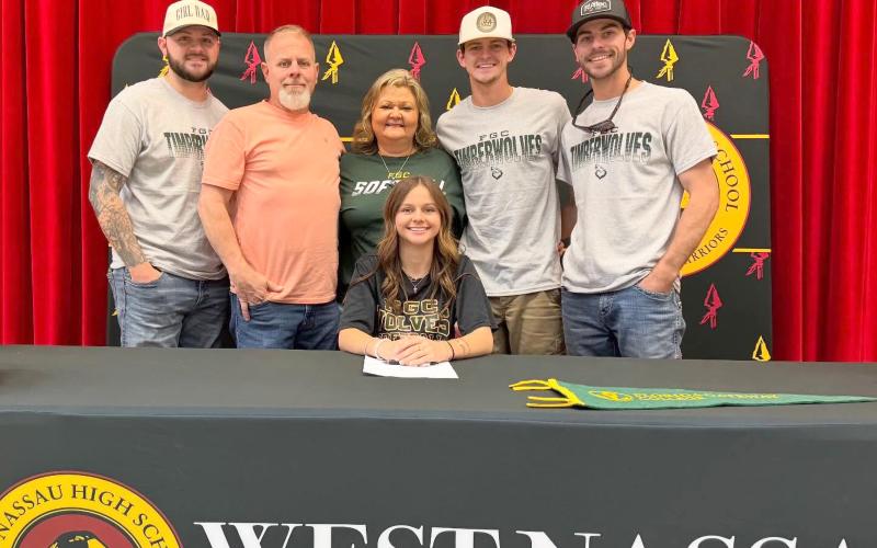 West Nassau High School senior Lauren Rosepiler signs with Florida Gateway College Dec. 17.