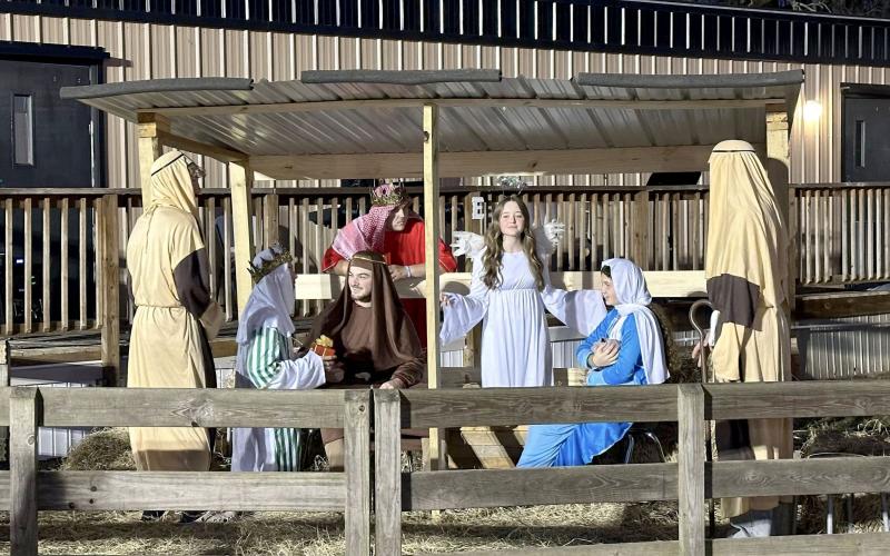 Sonshine Christian Academy families and members of the Crossroads Church congregation partake in a walk-through “Journey to Bethlehem” in Callahan Friday.