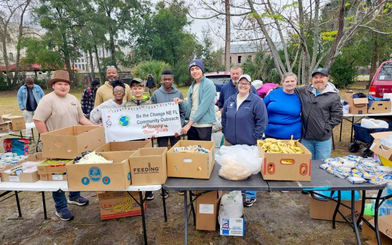 Scouts from Callahan Boy Scout Troop 351 assist with Be the Change Northeast Florida’s community outreach over Christmas break.