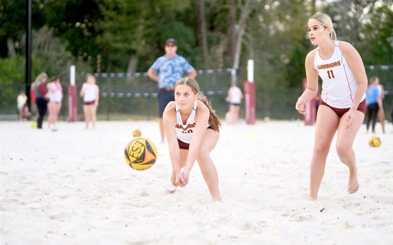 The beach volleyball team is ready for action.