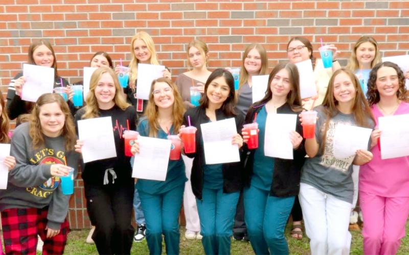 Hilliard Middle-Senior High CNA students celebrate a 100% pass rate.
