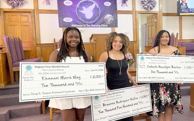 Khamani Way, Breanna Rodriguez-Rollins and Celeste Barket receive their scholarships.