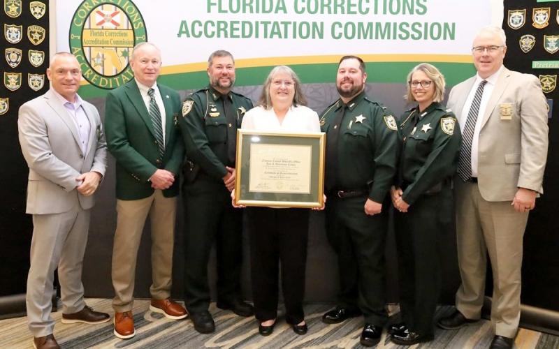 Sheriff Bill Leeper and Nassau County Sheriff Office representatives receive the designation.
