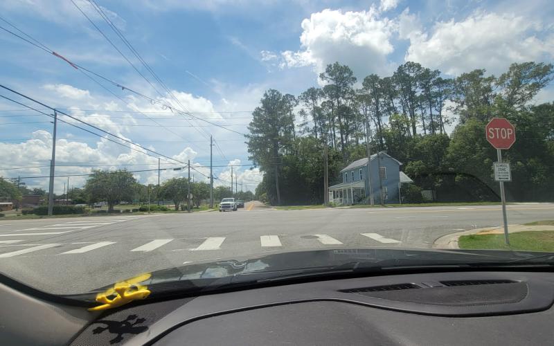 The former caution light at Mickler Street and U.S. 301 in Callahan is gone. It was removed June 17 after it was damaged. It previously aided motorists coming from the west, alerting them that they were entering a small town with reduced speeds and cross traffic. Photo by Amanda Bishop