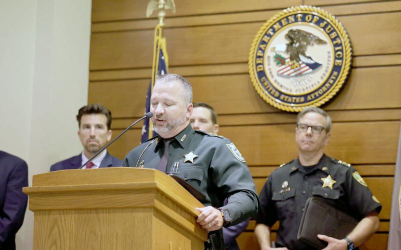 Nassau County Sheriff’s Office Undersheriff Jon Hooper addresses 13 alleged gang members arrested at a Department of Justice press conference in Jacksonville. Submitted