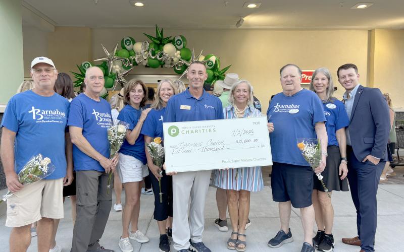 Barnabas Center accepts a $15,000 donation from Publix Super Markets Charities in celebration of the grand opening of the new Fernandina Beach store. Submitted