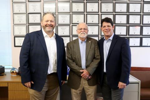 New Southeast Region Publisher Todd WIlson and retiring Coastal Region Publisher Foy Maloy join Community Newspapers, Inc. President Mark Major Dec. 17. 