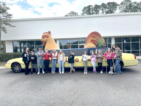 In celebration of fundraiser success, Callahan Intermediate School students ride in a chicken limo to enjoy lunch at Chick-fil-A. 