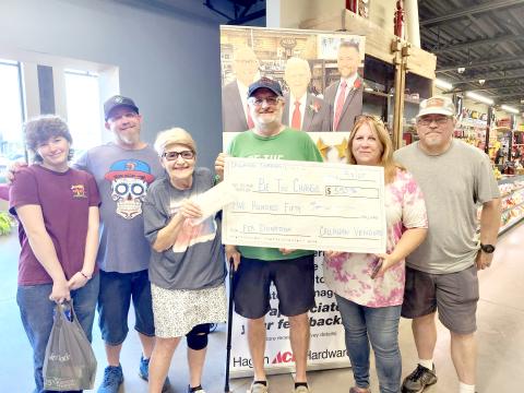 Joel Pace accepts a $550 donation for Be the Change Northeast Florida Feb. 8.