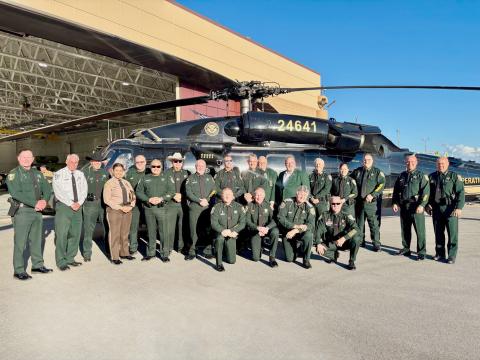 Nassau County Sheriff Bill Leeper, bottom row second from the left, joins other state sheriffs in Miami-Dade County for a news conference about the 287 (g) program. All 67 Florida counties have entered an agreement with ICE to assist in serving warrants to illegal immigrants. Submitted