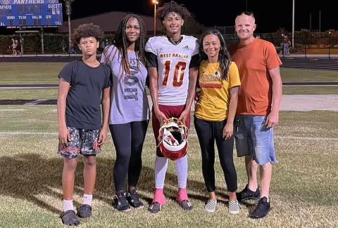 Latasha Taylor stands between sons Bryson and Braydon Taylor, joined by daughter Lexie Jones and husband Tony Taylor. A benefit for the Taylor family will be held Saturday to assist with expenses as Latasha Taylor continues to recover from her injuries. Submitted