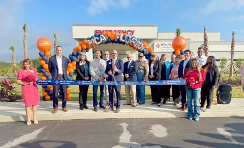Members of the Nassau County Chamber of Commerce and Nassau County commissioners celebrate the opening of HCA Florida Yulee Emergency with HCA CEO Reed Hammond and the medical staff March 31. 