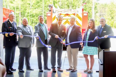 County leaders cut the ceremonial ribbon May 7 to open Nassau County Fire Rescue Station 10 in Yulee. From left, NCFR Chief Brady Rigdon, county commissioners Klynt Farmer, Jeff Gray, A.M. “Hupp” Huppmann, GreenPointe Holdings, LLC President Mike Taylor and county commissioners Alyson McCullough and John Martin. Photo by Ashley Chandler