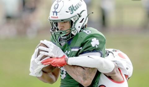 Chaz Davis carries the ball for Mercyhurst University against Frostburg State University Sept. 28. Frostburg won 25-24. Davis, a Callahan native, enters his final season of collegiate football this year. He catches the ball for a touchdown during homecoming against Buffalo State University Oct. 5. The Lakers shut out the Bengals 55-0.