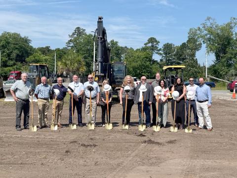 George Knabb, Sr., Mike Stokes, Bill Hagan, Mike Griffis, Lance McCubbin, Deanna Dinkins, Angela Drury, Callahan Mayor Randy Knagge, Joel Barber, Rebecca Rounsville, Marah Davis, James Owens and Wade Johnson celebrate the groundbreaking of the new state-of-the-art TRU-FI Credit Union branch in Callahan May 20. Submitted