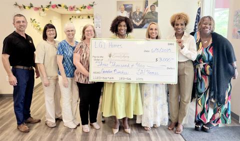 LGI Homes recently donated $3,000 to the Nassau County on Council on Aging to support building benches at the Westside Senior Life Center in Hilliard. NCCOA President and CEO Janice Ancrum and staff accept the donation.