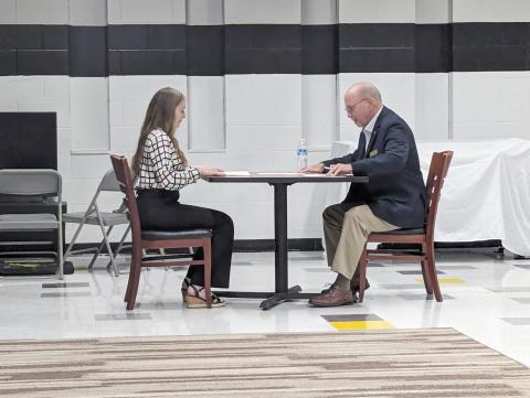 Nassau County Commissioner John Martin interviews a student during “The Great Shake off” at Sonshine Christian Academy. The panel of interviewers included, from left, Martin, Pastor Marty Paparo, Pastor Jeul Strickland, Nassau County Commissioner Klynt Farmer and Ken Griffin. Submitted