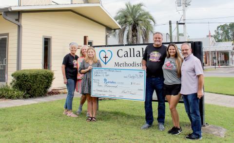 Barnabas Center’s McKinney-Vento Program receives a $10,000 donation from the Memorial Day Rod Run 4 Kidz. 