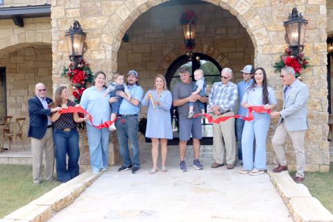 obbie Walker cuts the ribbon to celebrate the official grand opening of The Winery at Tuscan Rose Vineyards Saturday morning. She is joined by family members and Nassau County commissioners Alyson McCullough, John Martin and A.M. “Hupp” Huppmann. The winery is located at 45884 Bismark Road and includes a tasting room, outside seating, and a gift shop with various jams, jellies and other items. Weekend specials were served, including burrata and caprese salads, woodfired pizzas and more. Live music for the g