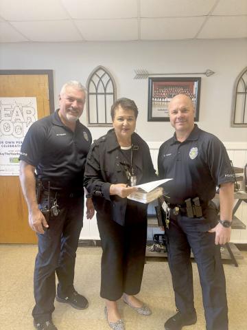Callahan Elementary School welcomes new school resource officer Billy Johns Monday morning. He replaces Officer DJ Valentine, who was promoted to a new position with the school district and was on campus with Johns Monday. They are pictured with Superintendent Kathy Burns. Submitted
