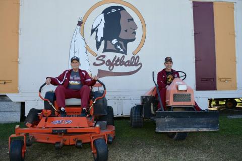 Coach David Crosby, left, befriended Staten Dempsey and the duo spent numerous hours maintaining the softball and football fields at West Nassau High School. Crosby guided softball players for decades, also mentoring fellow coaches. Submitted